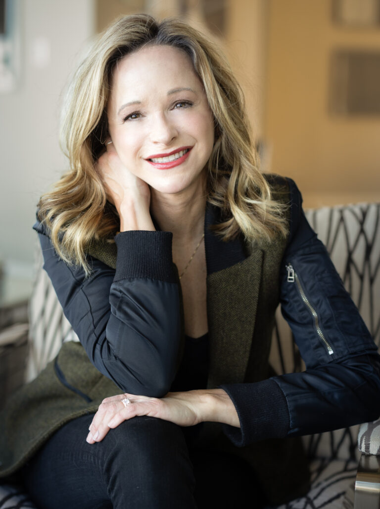 Owner of Fringe & Form Michele Dieckmeier poses at her store.