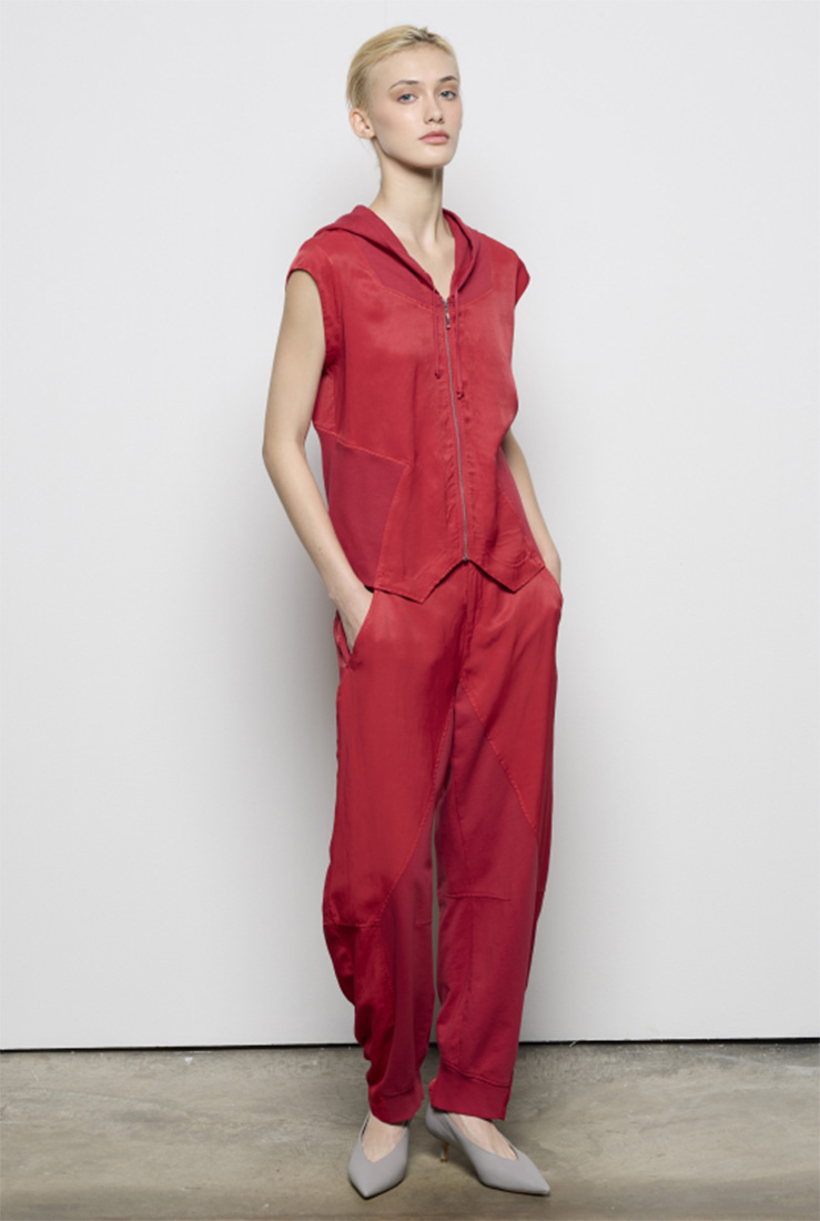 EUS25_Pic 2 Woman in red linen blouse and red high waisted pants.